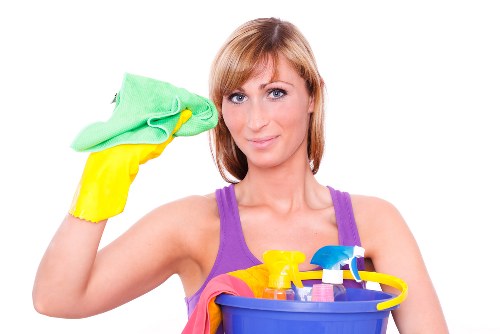 Commercial cleaning professional maintaining a bright office lobby