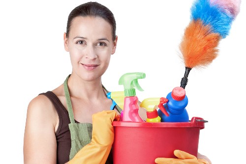 Professional house cleaning in a bright living room